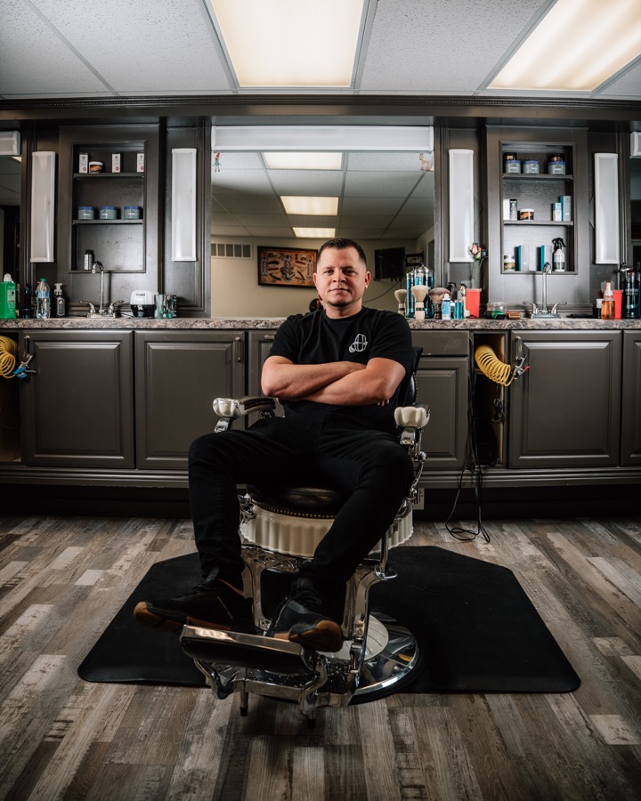 Omar, barber at Don Oscar's Barbershop
