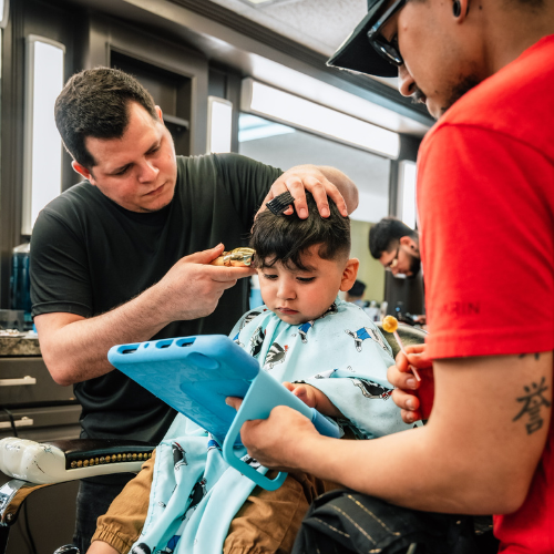A child getting a hair cut