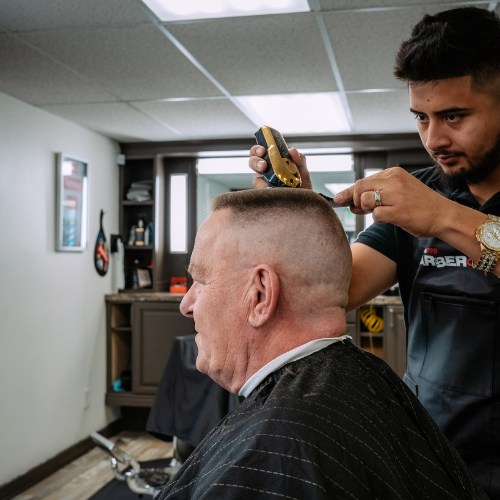 Cutting the hair of an older gentleman