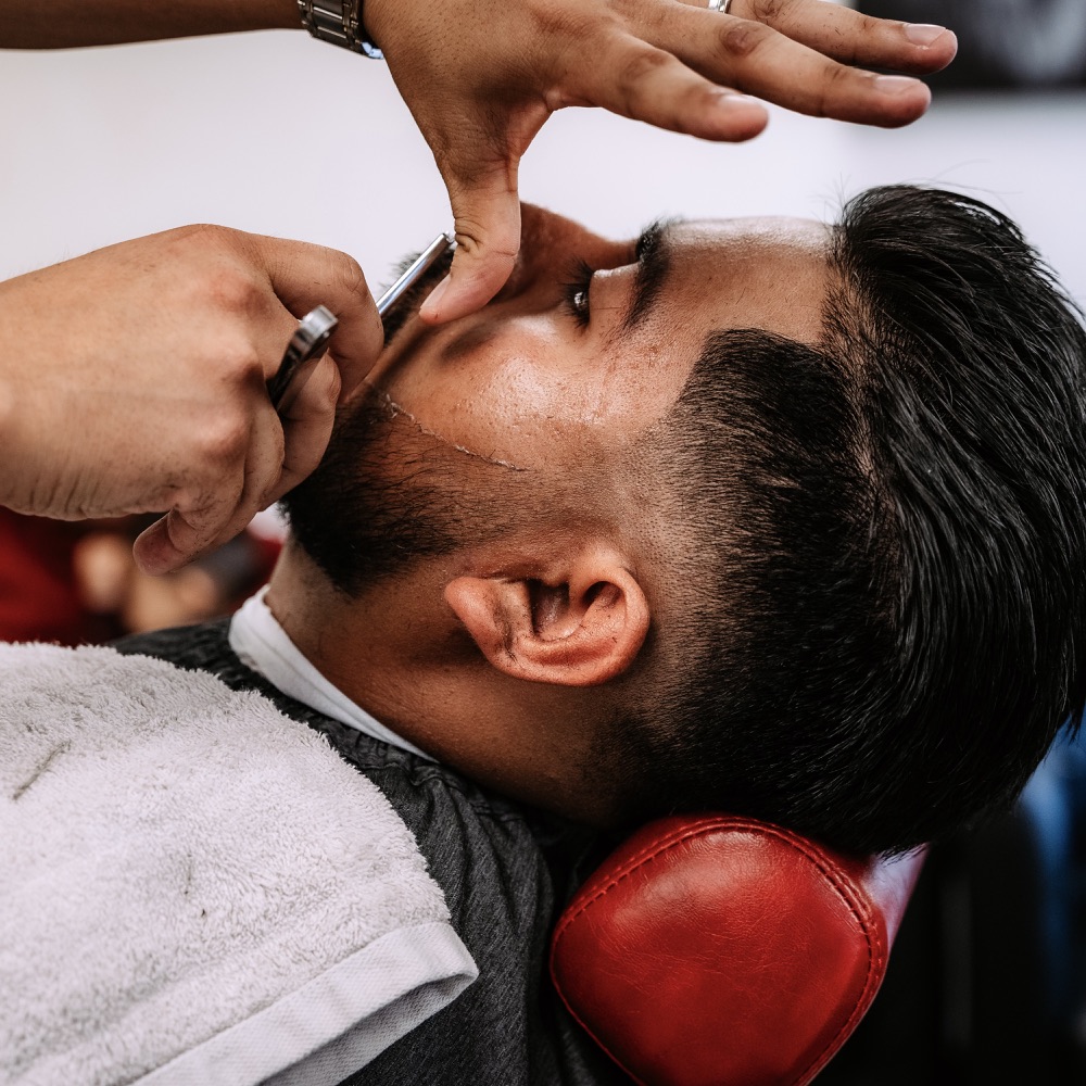A shaped beard and fresh haircut